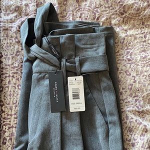 Grey trousers (tags on)